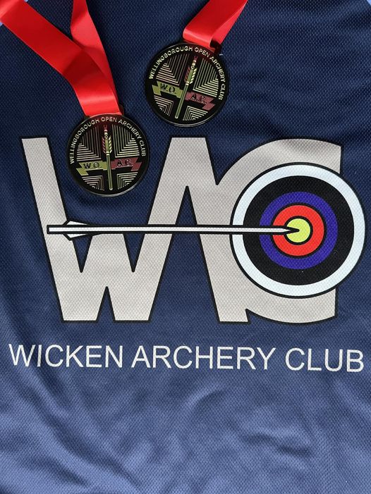 Medals on background of Wicken Archery T shirt
