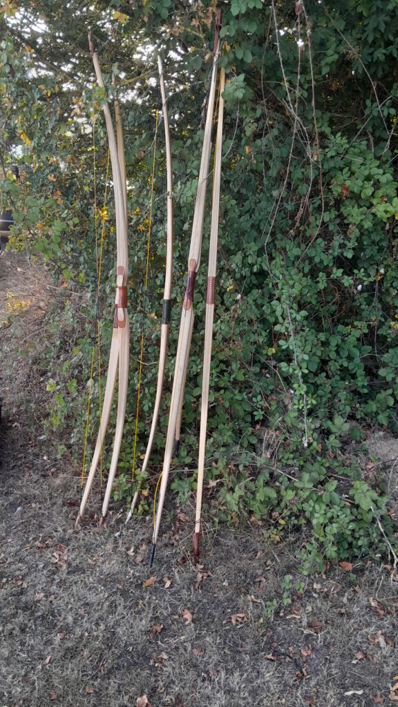 A variety of longbows and flat bows
