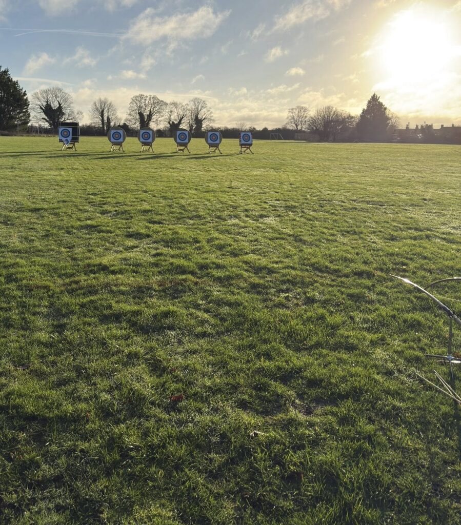 Wicken archery field with surprising glow in the sky